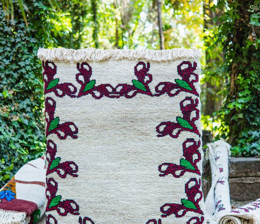 This piece deconstructs the floral form, shifting focus to a vast, textured ivory void. It proves that even when details are stripped away, the foundation remains strong.