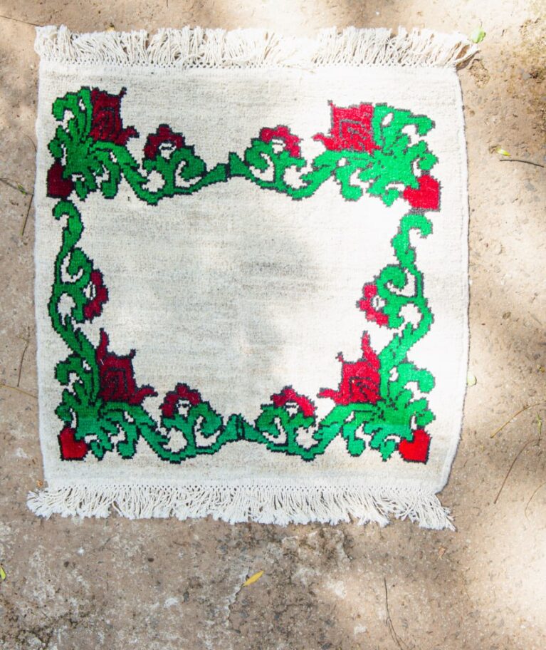 In this piece flowers evolve from decoration into a confident frame that holds the entire rug together. It demonstrates a strength where the edge protects what it defines.